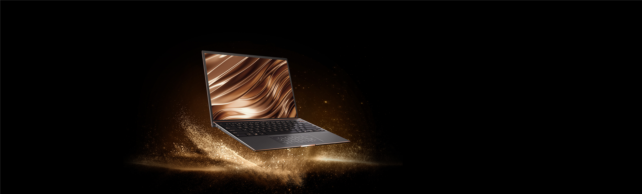 ZenBook S UX393 (11th Gen Intel) prikan na crnoj podlozi kako levitira na zlatnom prahu sa zlatnom pozadini izazivajući neverovatan konstrast koji savrseno prikazuje jednostavan i prelep dizajn ovog laptopa
