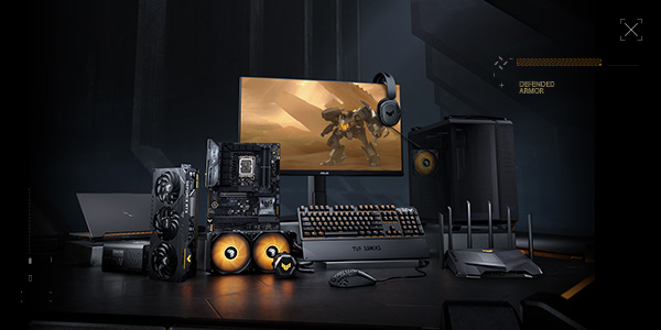 Un ensemble de produits TUF Gaming, comprenant une carte mère, une carte graphique, des périphériques et un moniteur.