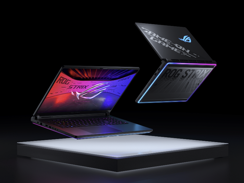 Two ROG Scar laptops hovering, one with its screen facing the camera and one shown from behind