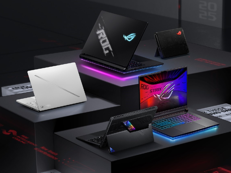 ROG laptops arranged on blakc counters of varying heights