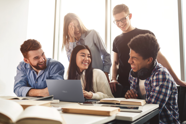 A group of students enjoying working on an ASUS laptop