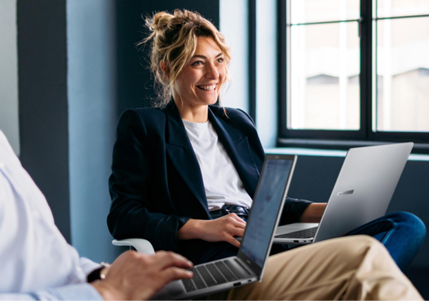People using ASUS laptops in a meeting